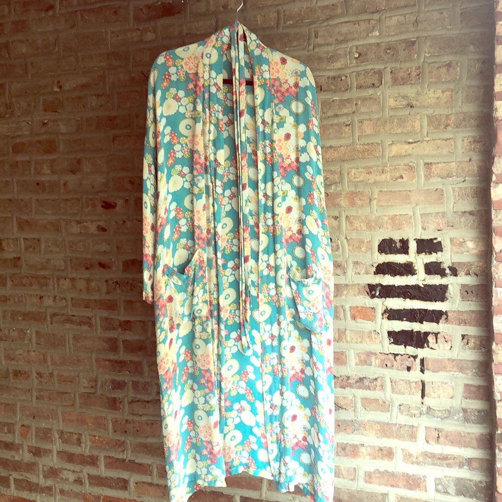 Long, flower patterned silk robe.